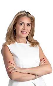 Aesthetician Fabiola Korin smiling and crossed arms, looking professional