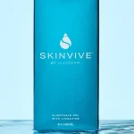 A blue box of the Skinvive with logo